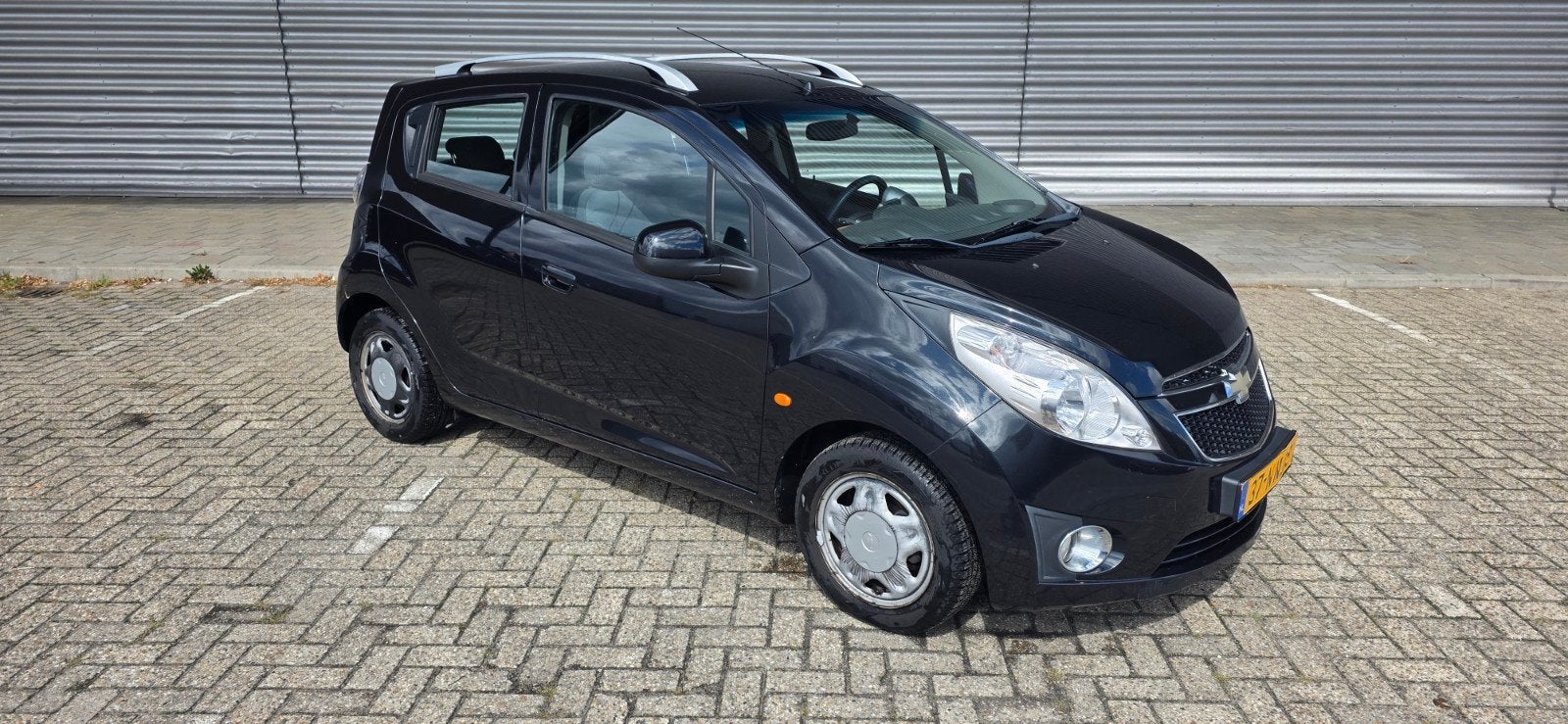 Chevrolet Spark 1.0 2010 Zwart, Auto's, Chevrolet, Voorwielaandrijving, 839 kg, Stof, Multifunctioneel stuurwiel