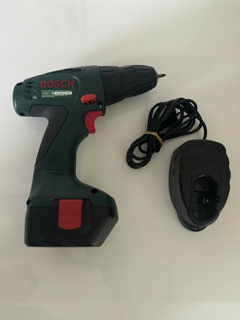 Bosch PSR 1200 Accuboormachine met lader, Gebruikt, Variabele snelheid, Ophalen of Verzenden, Boor- en Schroefmachine