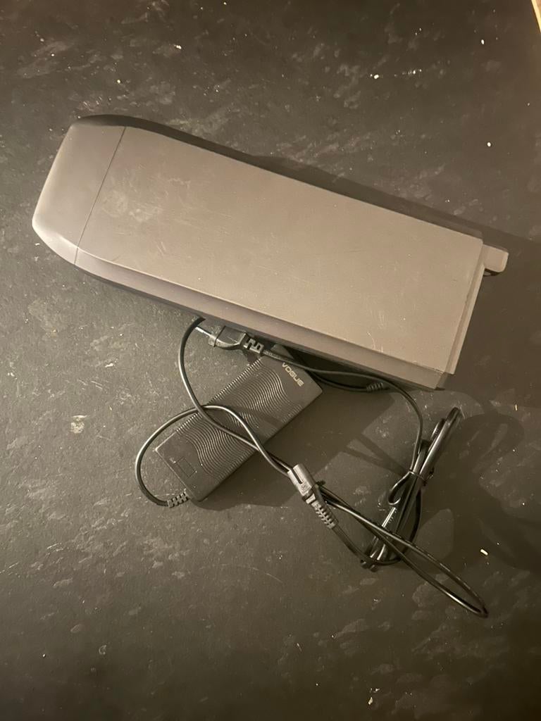 Accu en oplader Vogue elektrische fiets, Ophalen of Verzenden, Zo goed als nieuw