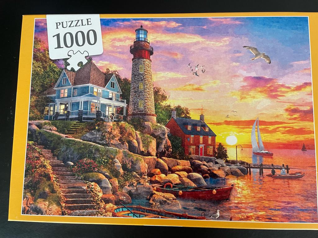 Legpuzzel 1000 stukjes - Vuurtoren zonsondergang, Ophalen of Verzenden, 500 t/m 1500 stukjes, Zo goed als nieuw, Legpuzzel