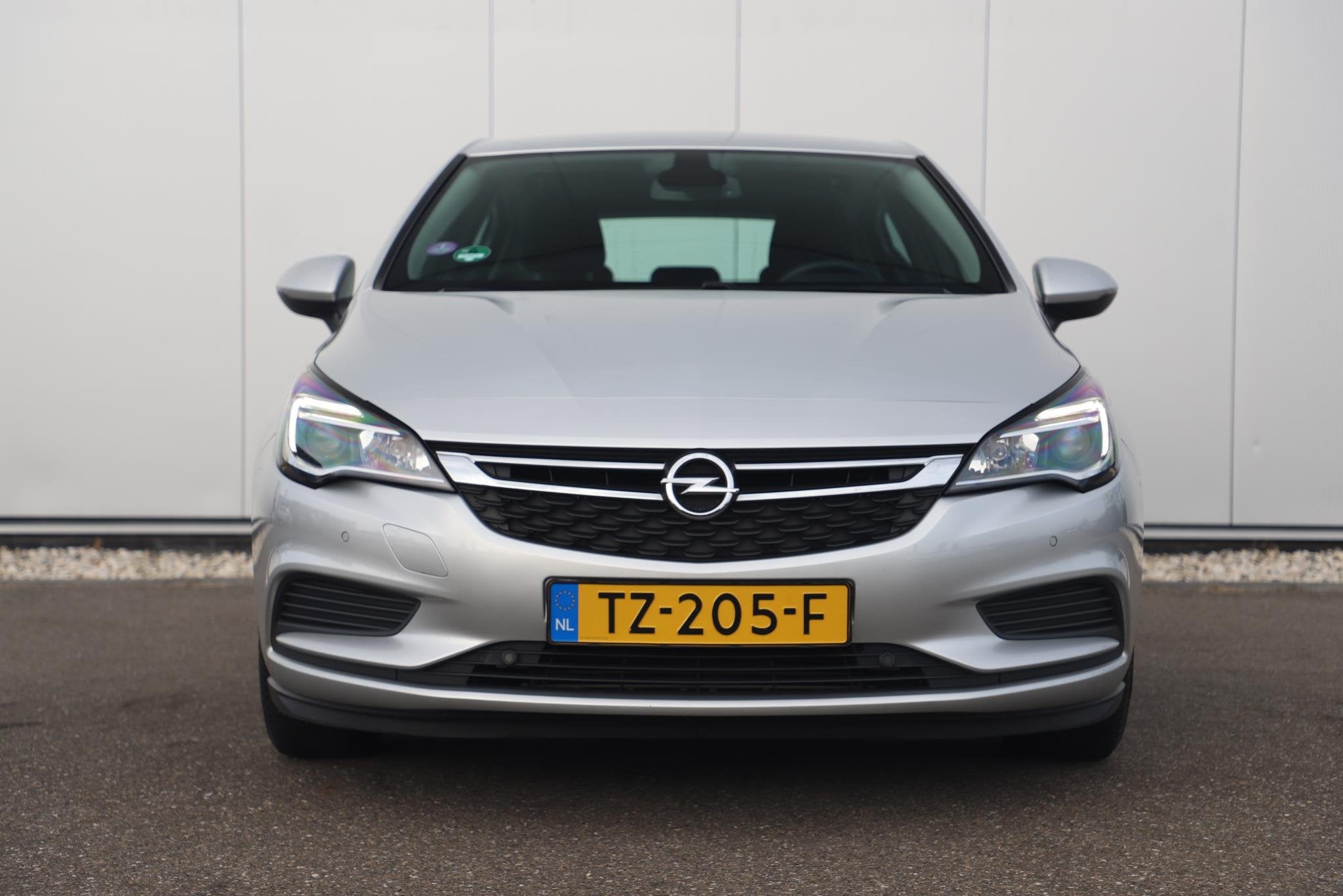 Opel Astra 1.0 Online Edition Navigatie Airco Cruise PDC Blu, Stof, Gebruikt, Euro 6, Met garantie (alle)