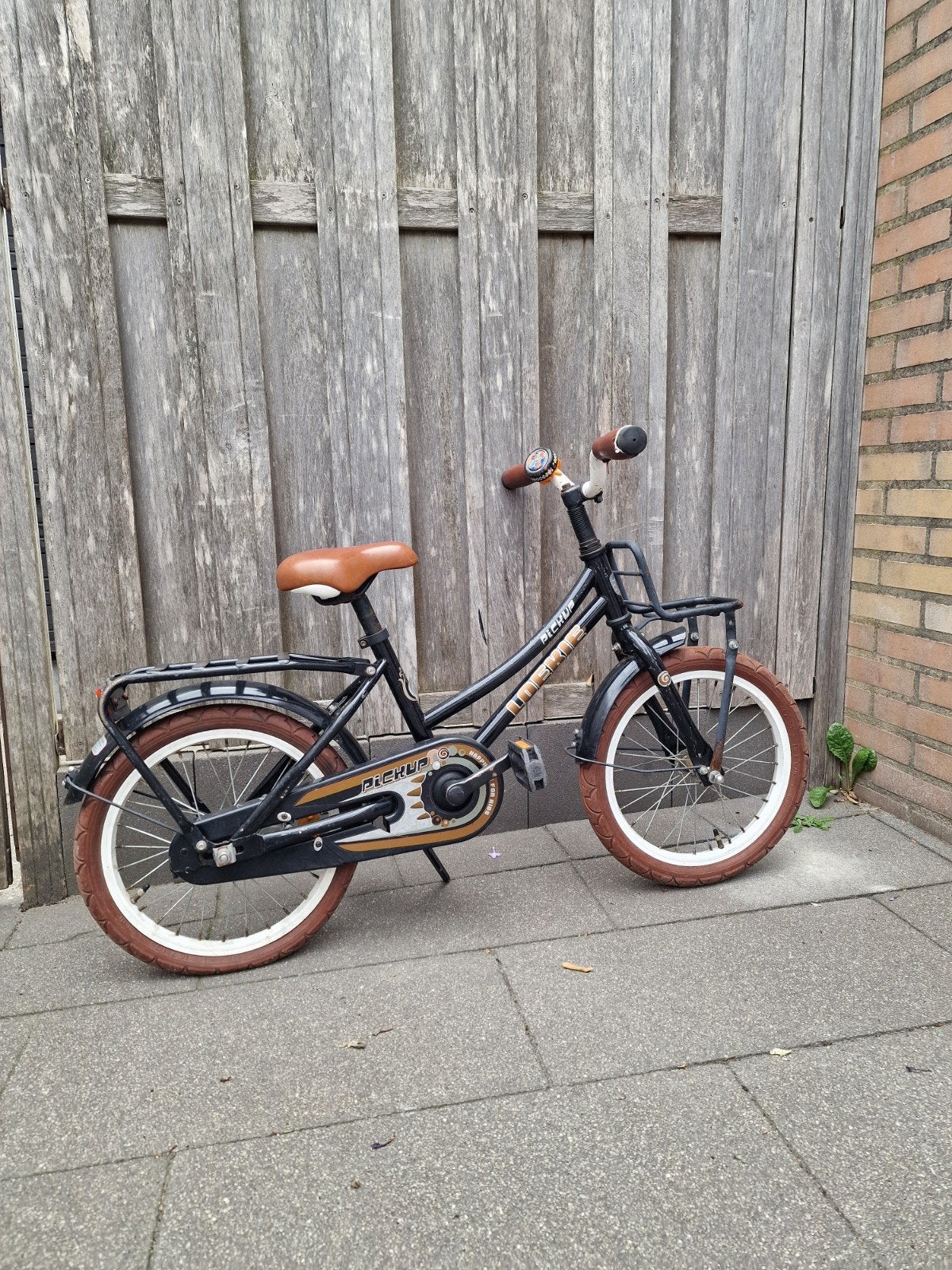 Zwarte Loekie kinderfiets met bruine accenten - Gebruikt, Fietsen en Brommers, Fietsen | Kinderfietsjes, Terugtraprem, Ophalen