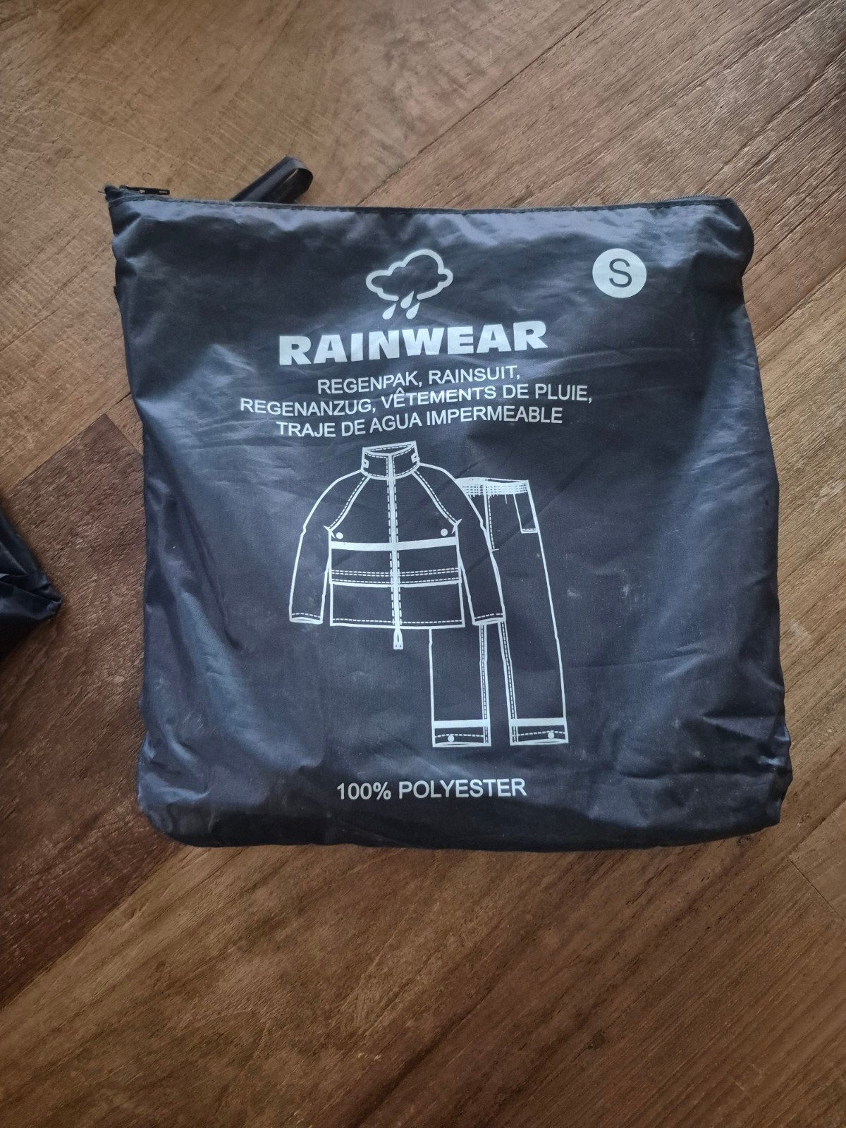 Nieuw opgedragen regenpak - Maat S, Ophalen of Verzenden