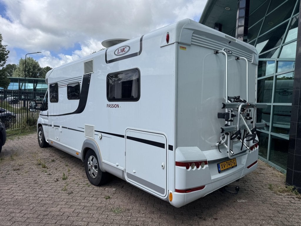 LMC Passion T672 AUTOMAAT ENKELE BEDDEN EURO6 25000KM, Caravans en Kamperen, Automaat, Fiat, Luifel, Bedrijf