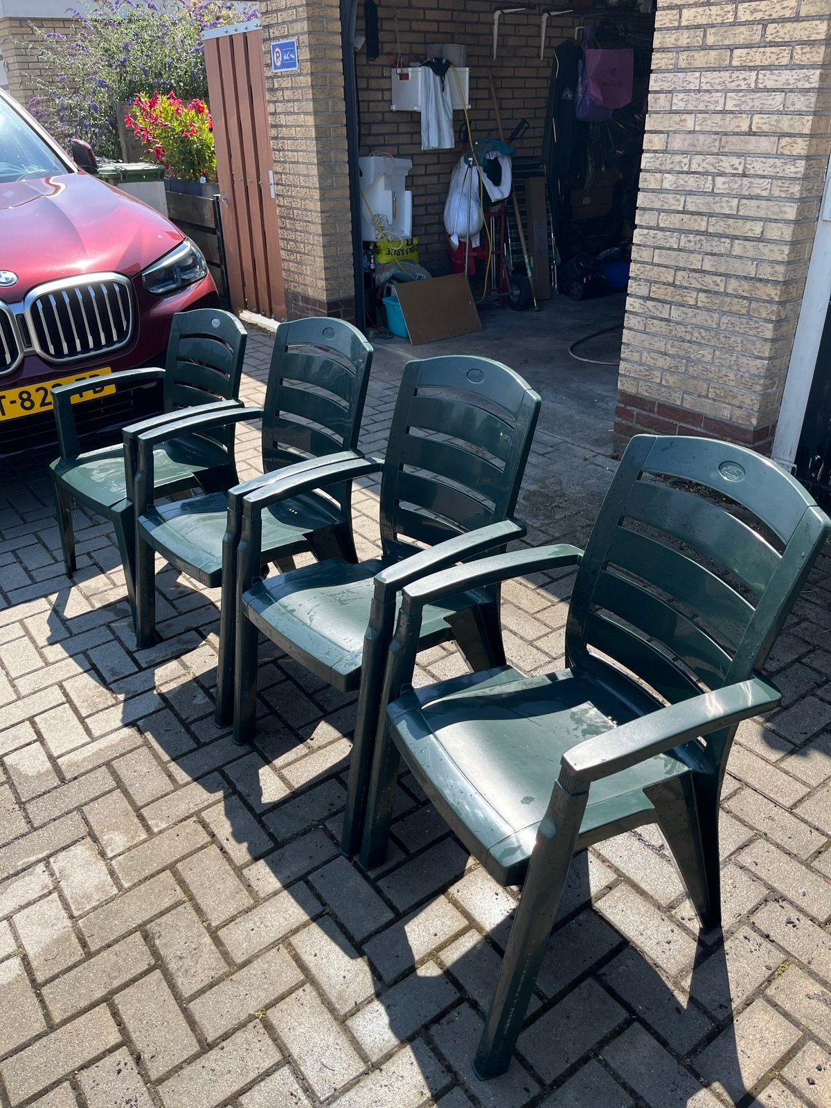 4 Groene kunststof tuinstoelen met armleuningen, Tuin en Terras, Tuinstoelen, Ophalen, Gebruikt, Kunststof, Stapelbaar
