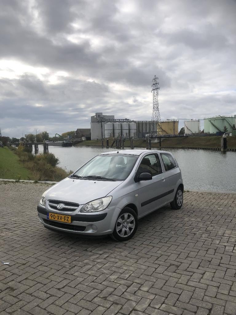 Hyundai Getz 1.1 3DRS 2007 Grijs, Auto's, Voorwielaandrijving, 4 cilinders, Origineel Nederlands, Handgeschakeld
