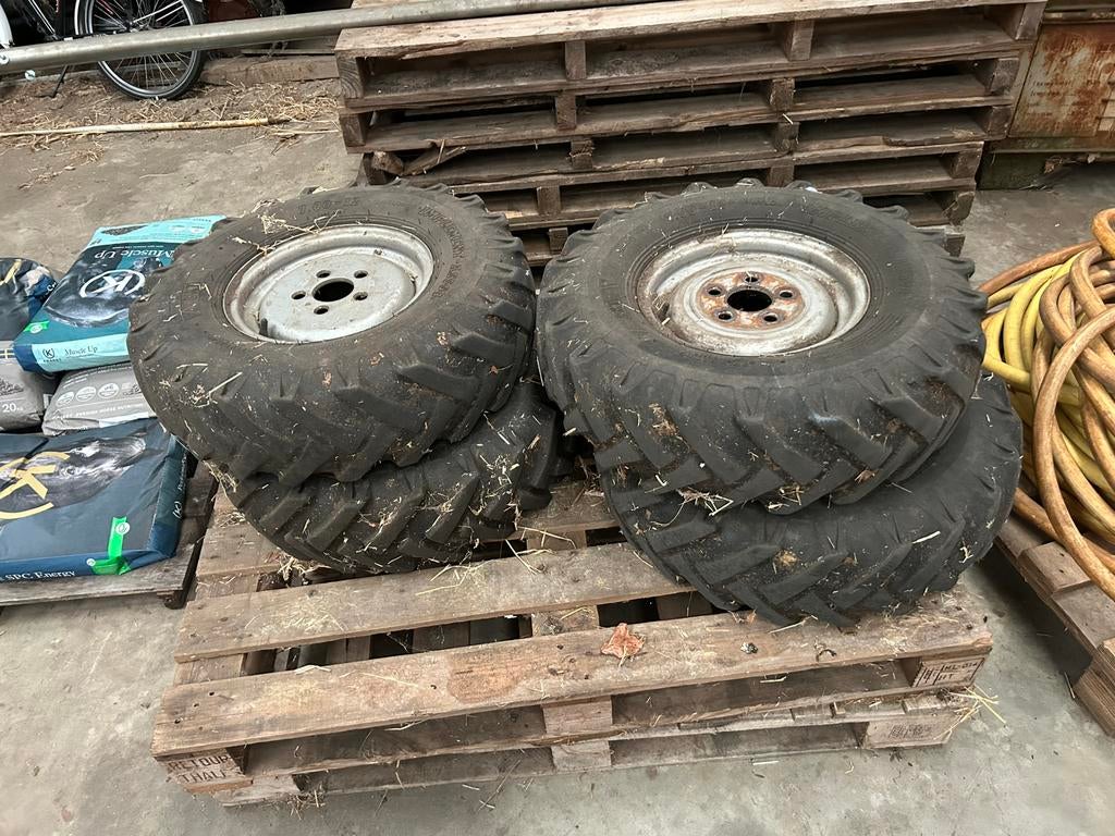 4x shovelbanden op velg 7.00-12, Ophalen