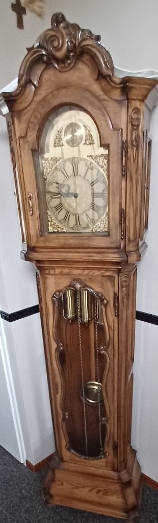 Klassieke eikenhouten staande klok, Ophalen