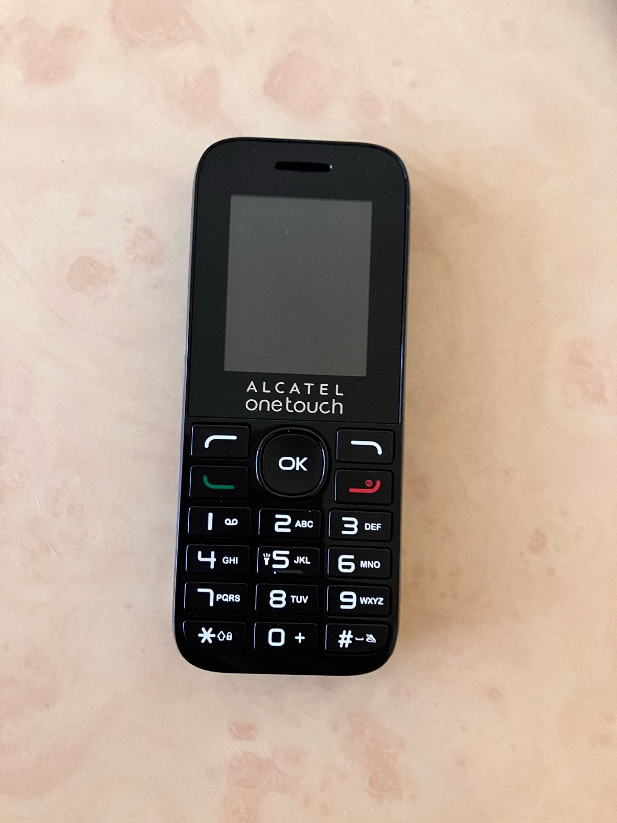 Alcatel One Touch 1016D - Inclusief oplader en oortjes, Geen camera, Ophalen of Verzenden, Zo goed als nieuw, Klassiek of Candybar
