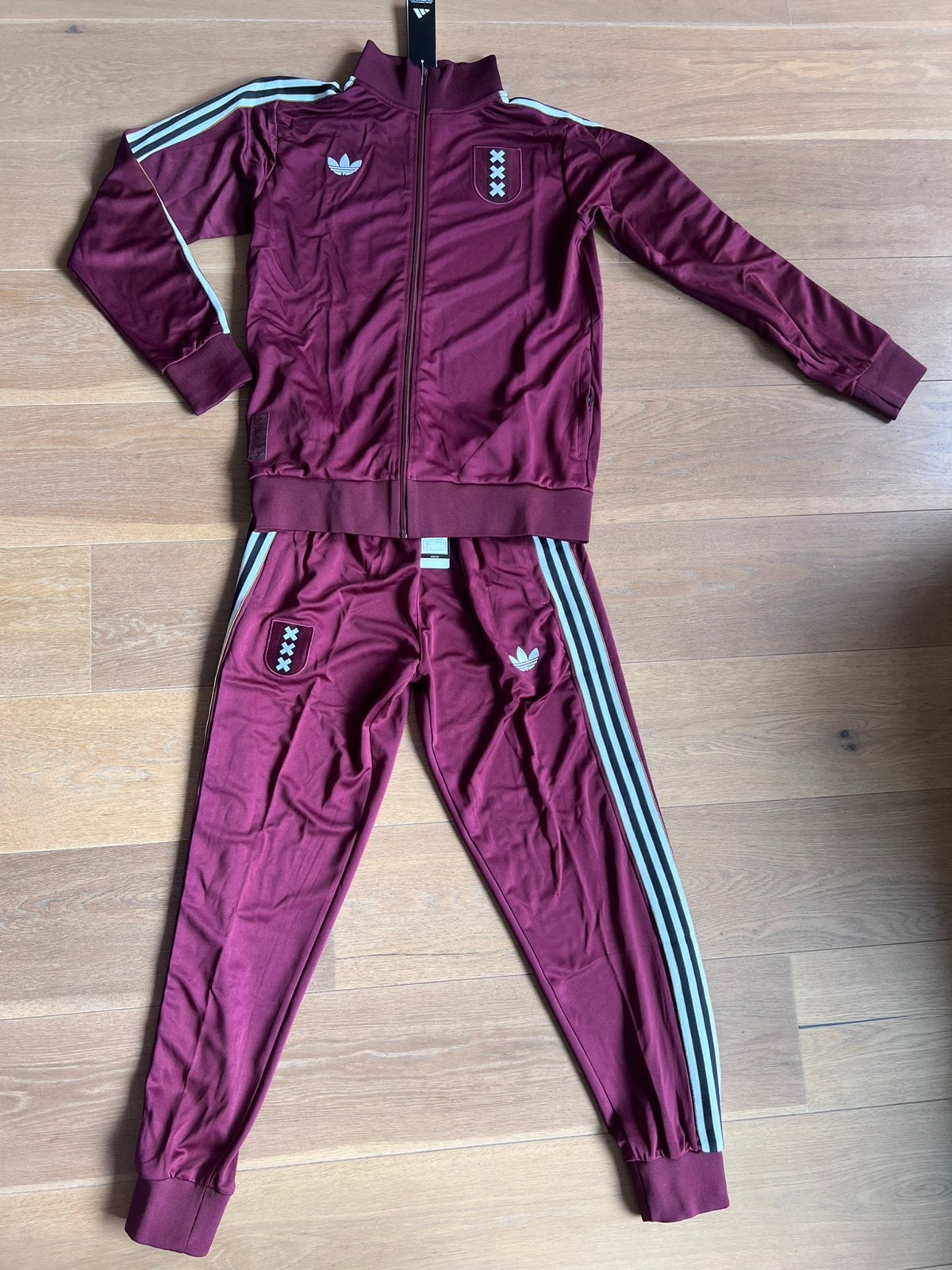Originals jubileum ajax/amsterdam trainingspak nieuw!, Maat L, Verzenden, Nieuw, Trainingspak