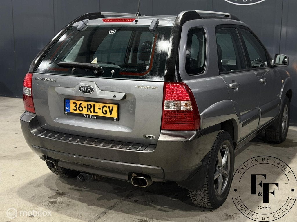 Kia Sportage 2.7 V6 Adventure 4WD|Automaat|Trekhaak|Carplay, Auto's, Kia, Automaat, Zwart, Bedrijf, Vierwielaandrijving