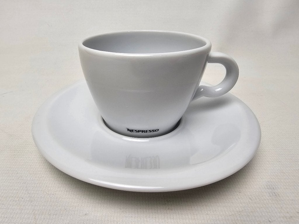 # Nespresso cappuccino kop en schotel, Gebruikt, Ophalen of Verzenden, Overige stijlen, Kop(pen) en/of Schotel(s)