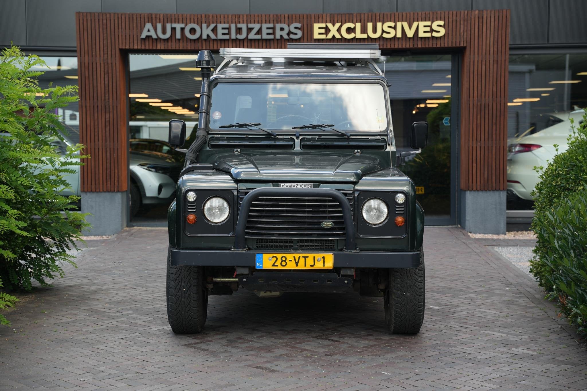 Land Rover Defender 2.5 Td5 SW 110" E, Auto's, Land Rover, Stof, Gebruikt, 2495 cc, 122 pk