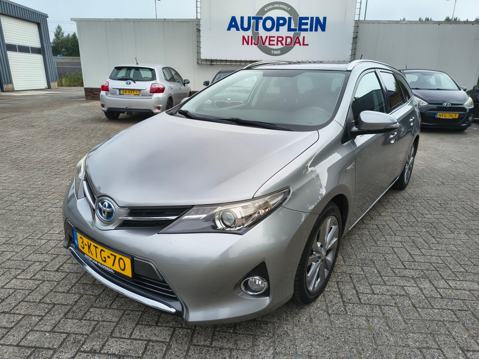 Toyota Auris Touring Sports 1.8 Hybrid Lease met trekhaak,na, Stof, Gebruikt, Origineel Nederlands, Start-stop-systeem