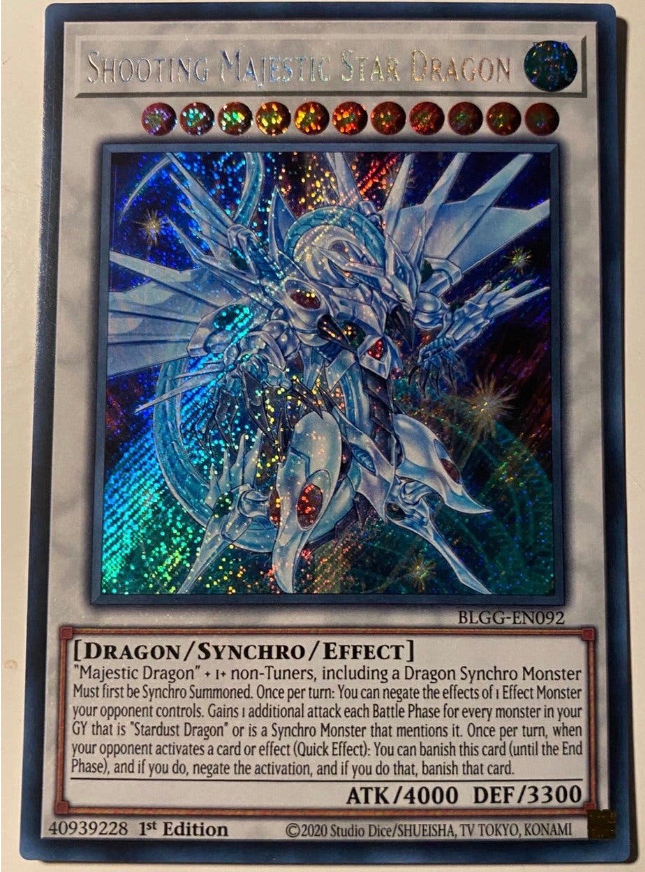 Yu-Gi-Oh! Shooting Majestic Star Dragon BLGG 1st Edition !, Ophalen of Verzenden, Zo goed als nieuw, Losse kaart, Foil