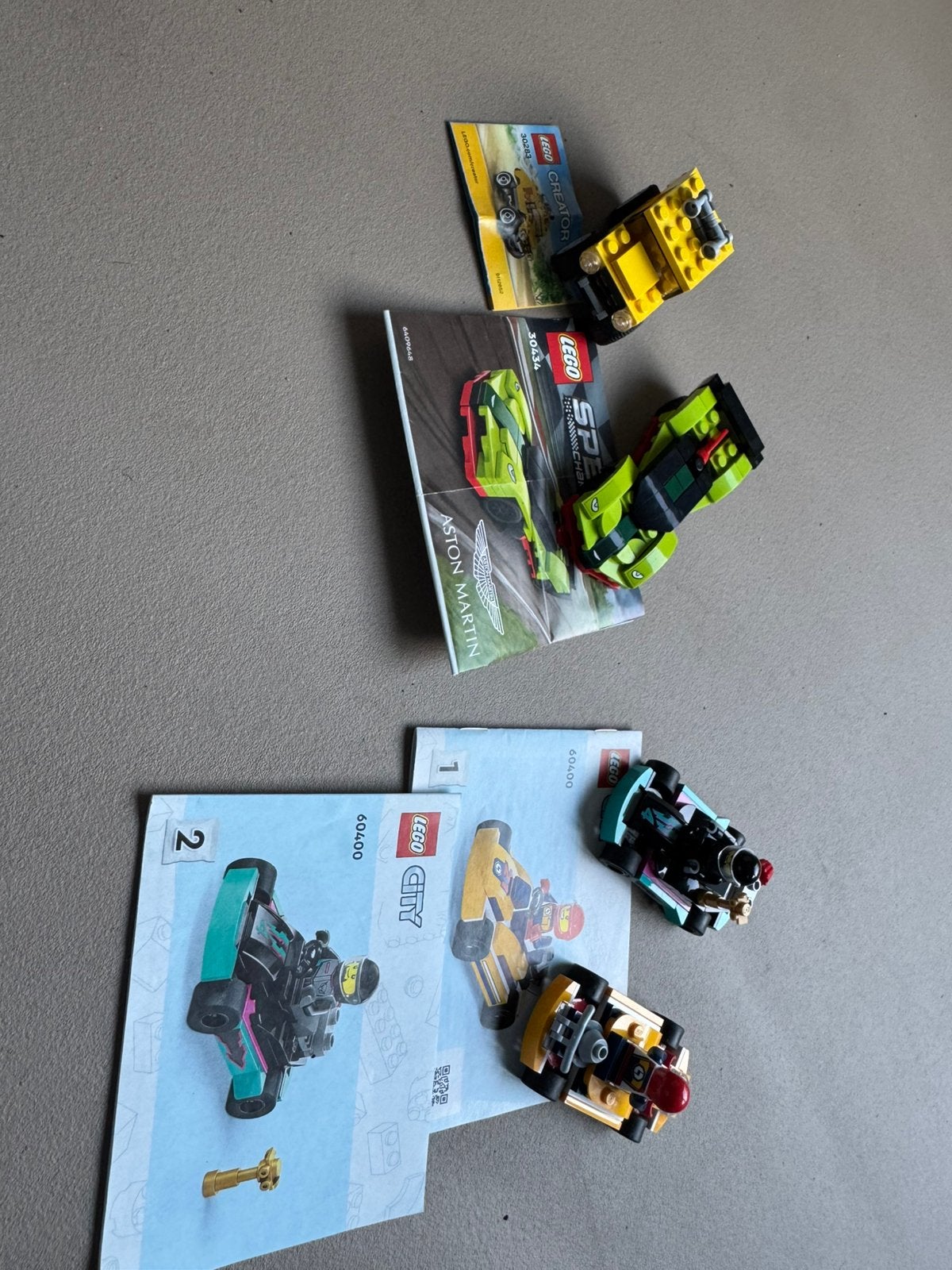 4 lego autootjes compleet met boekje, Ophalen of Verzenden, Zo goed als nieuw