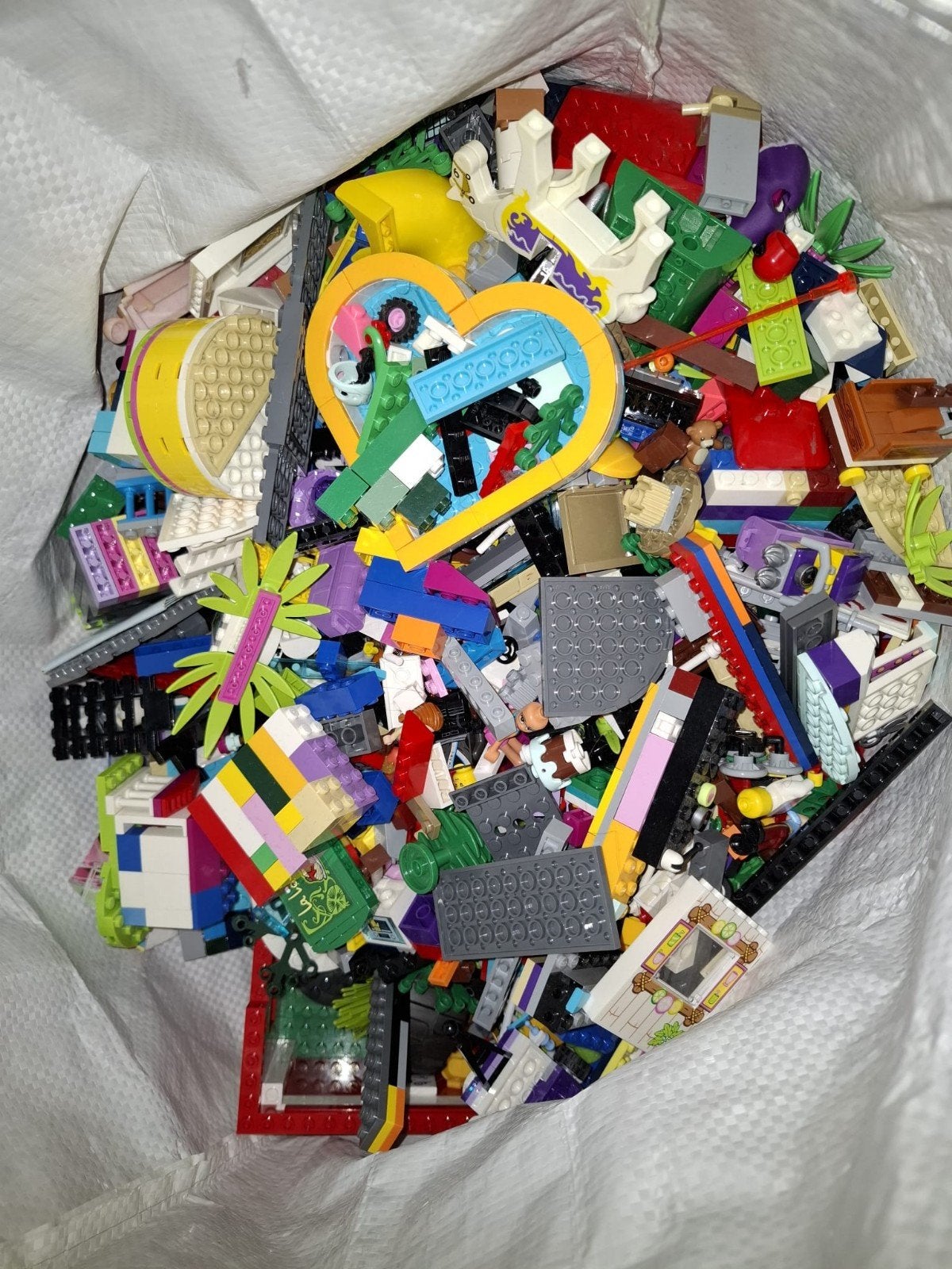 Grote tas vol LEGO en veel LEGO Friends poppetjes, Ophalen