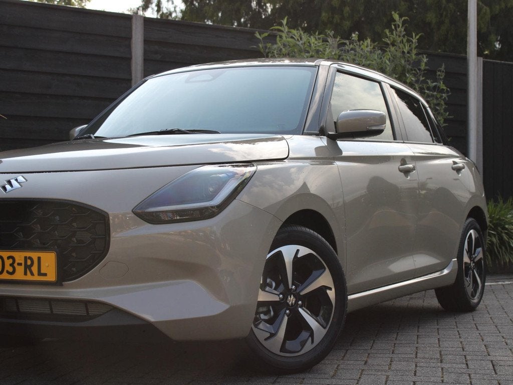 Suzuki Swift Style 1.2 Smart Hybrid 82PK 5DRS Navigatie, Par, Voorwielaandrijving, 12 maanden, Stof, Origineel Nederlands