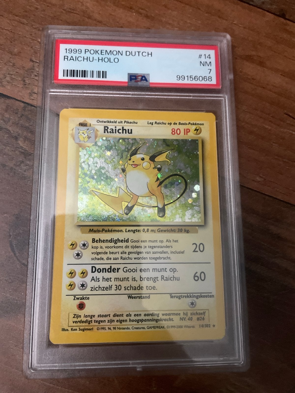 1999 Pokémon Dutch Raichu-Holo #14 PSA 7 NM, Ophalen of Verzenden, Zo goed als nieuw, Losse kaart, Foil