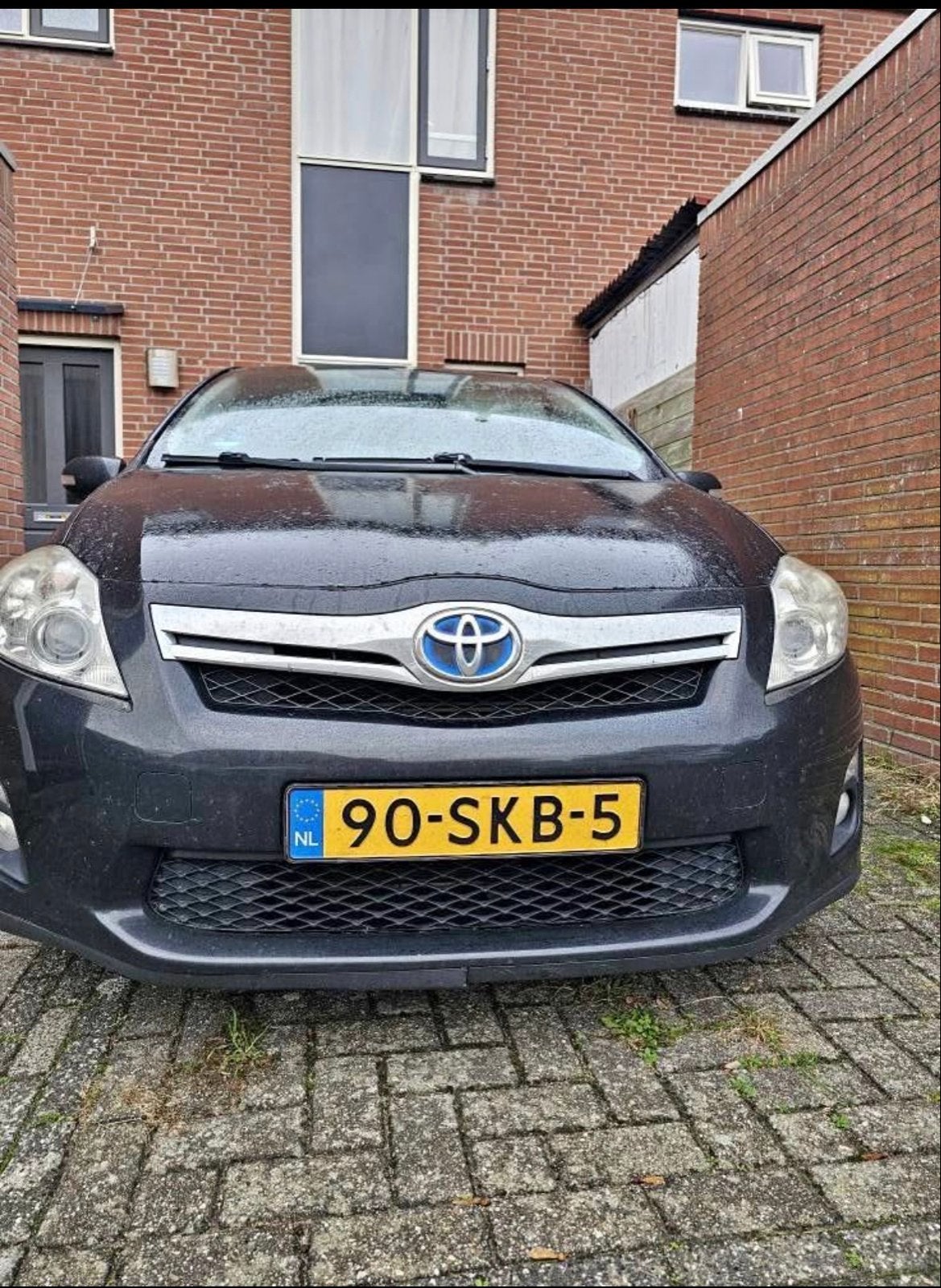 Toyota Auris 1.8 Full Hybrid 5DR CVT 2011 Zwart, Auto's, Zwart, Origineel Nederlands, 75 €/maand, 26 km/l