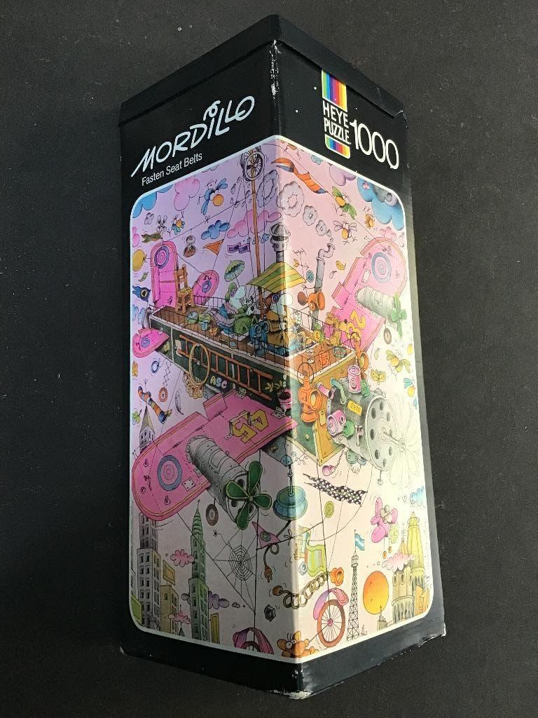 Heye Mordillo Puzzel Fasten Seatbelts 1000 stukjes, Ophalen of Verzenden, 500 t/m 1500 stukjes, Gebruikt, Legpuzzel