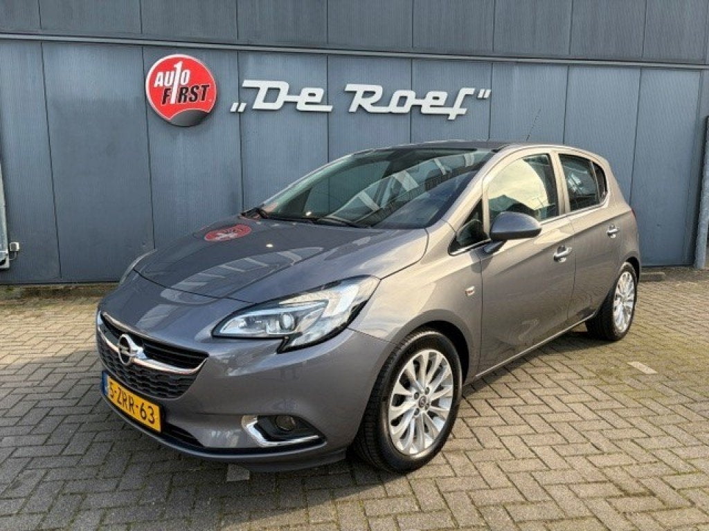 Opel CORSA-E 1.0 TURBO COSMO TREKHAAK CLIMA, Auto's, Gebruikt, Met garantie (alle), Verwarmde buitenspiegels, 116 pk