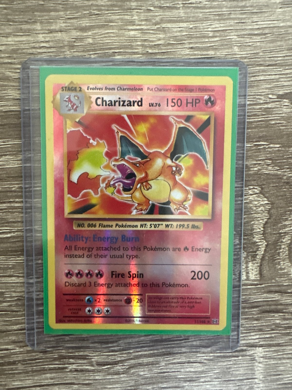 Charizard Reverse Holo Evolutions 11/108, Ophalen of Verzenden, Zo goed als nieuw, Losse kaart, Foil