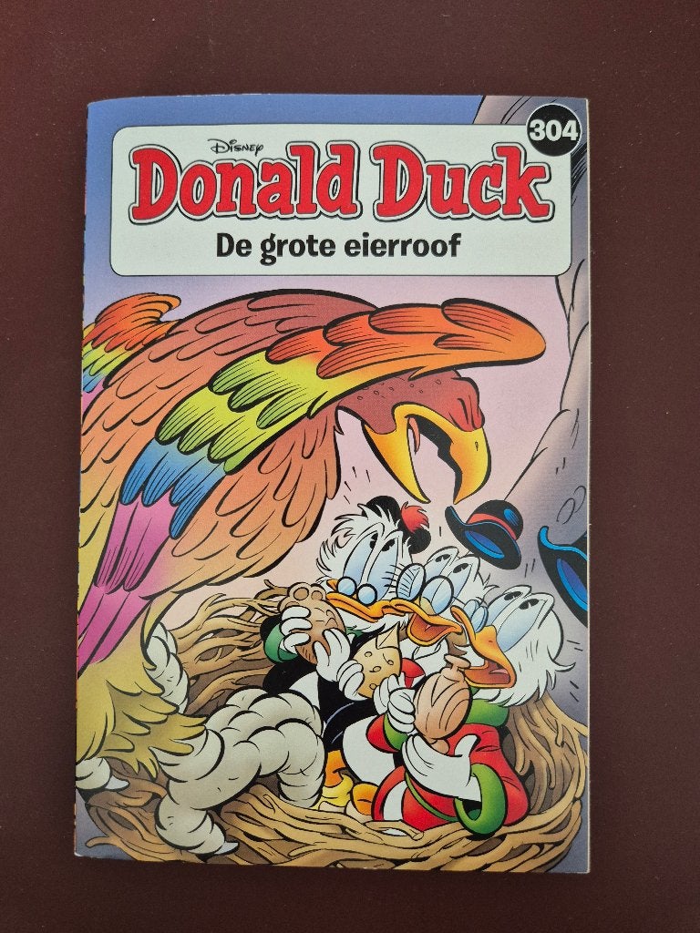 Donald Duck 304 - De grote eierroof, Boeken, Gelezen, Ophalen of Verzenden, Walt Disney, Eén stripboek