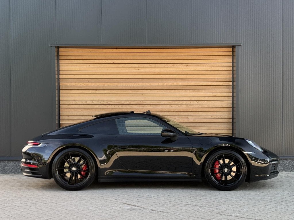 Porsche 911 992 3.0 Carrera 4S Sport-Chrono|SCHUIFDAK|SPORTU, Auto's, Porsche, Automaat, Gebruikt, 4 stoelen, Zwart
