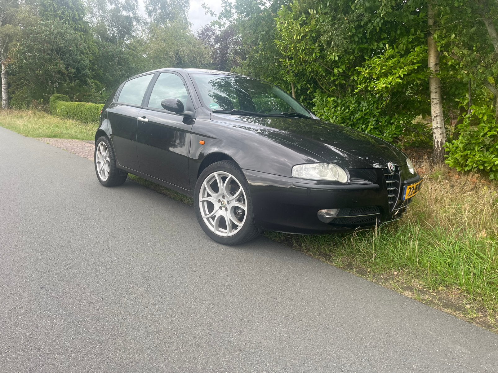 Nette Alfa Romeo 147 1.6 T.spark 16V 88KW 5DR 2002 Zwart, Voorwielaandrijving, 1195 kg, 4 cilinders, 400 kg