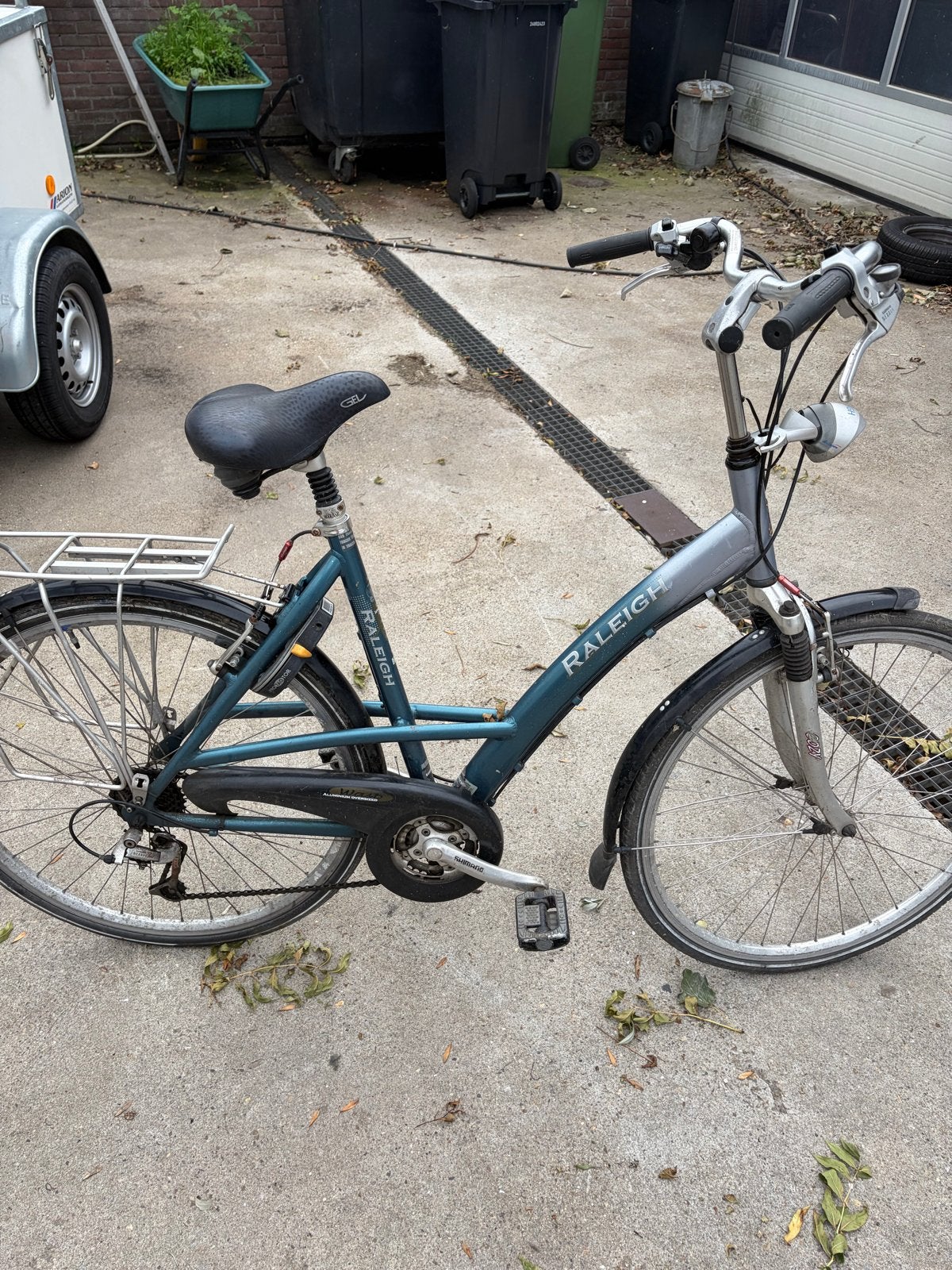 Raleigh damesfiets met versnellingen en vering, Fietsen en Brommers, Overige merken, Velgrem, Versnellingen, Ophalen of Verzenden