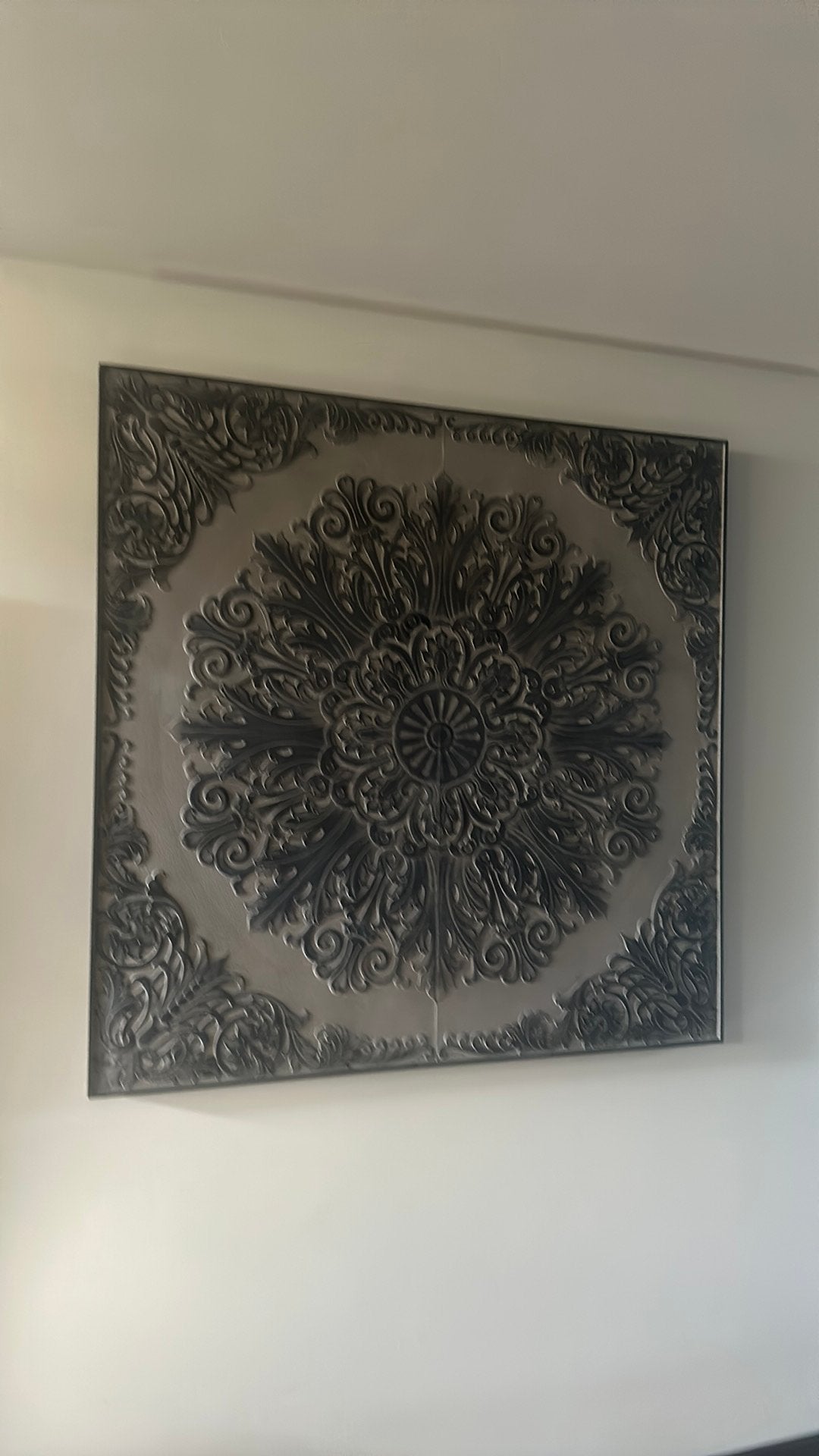 Schilderij met relief, Ophalen