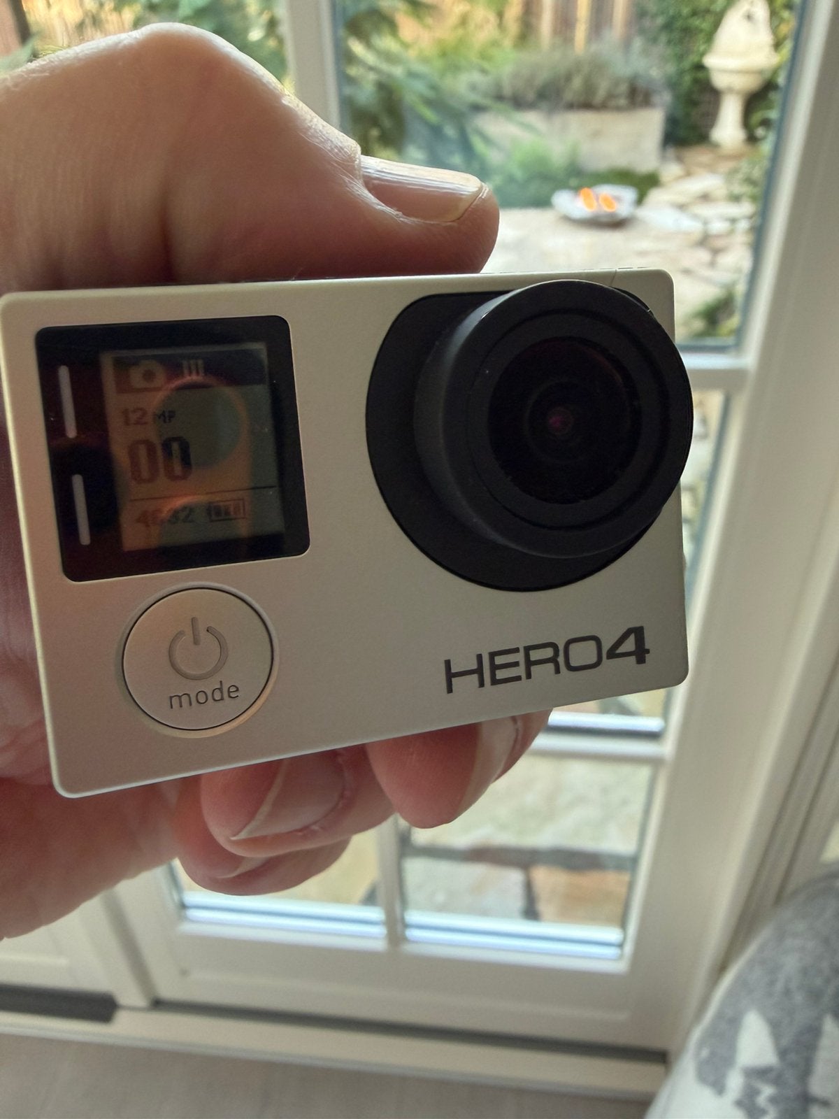 Foto 3 van GoPro Hero 4, met opbergtas, sd card en accessoires