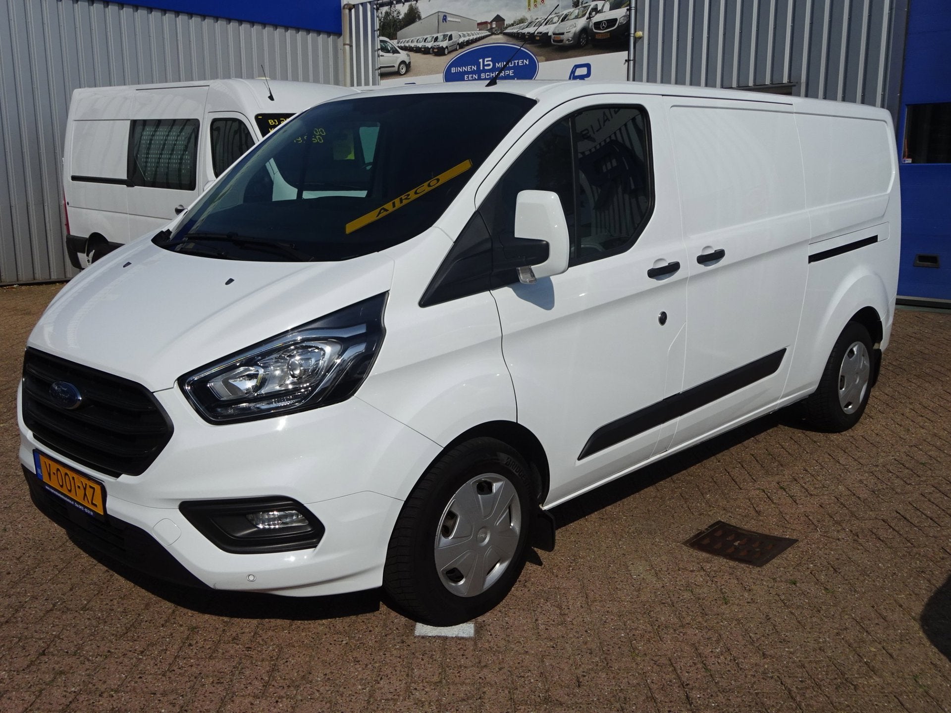Ford Transit Custom 300 2.0 TDCI 130 PK L2H1 Trend AUTOMAAT, Dealer onderhouden, Stof, 4 cilinders, Wit