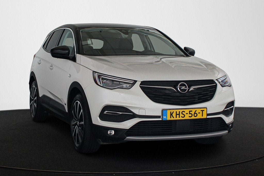 Opel Grandland X 1.6 Turbo Hybrid Ultimate Stoelventilatie D, Auto's, Opel, 228 pk, 4 cilinders, Wit, Bedrijf