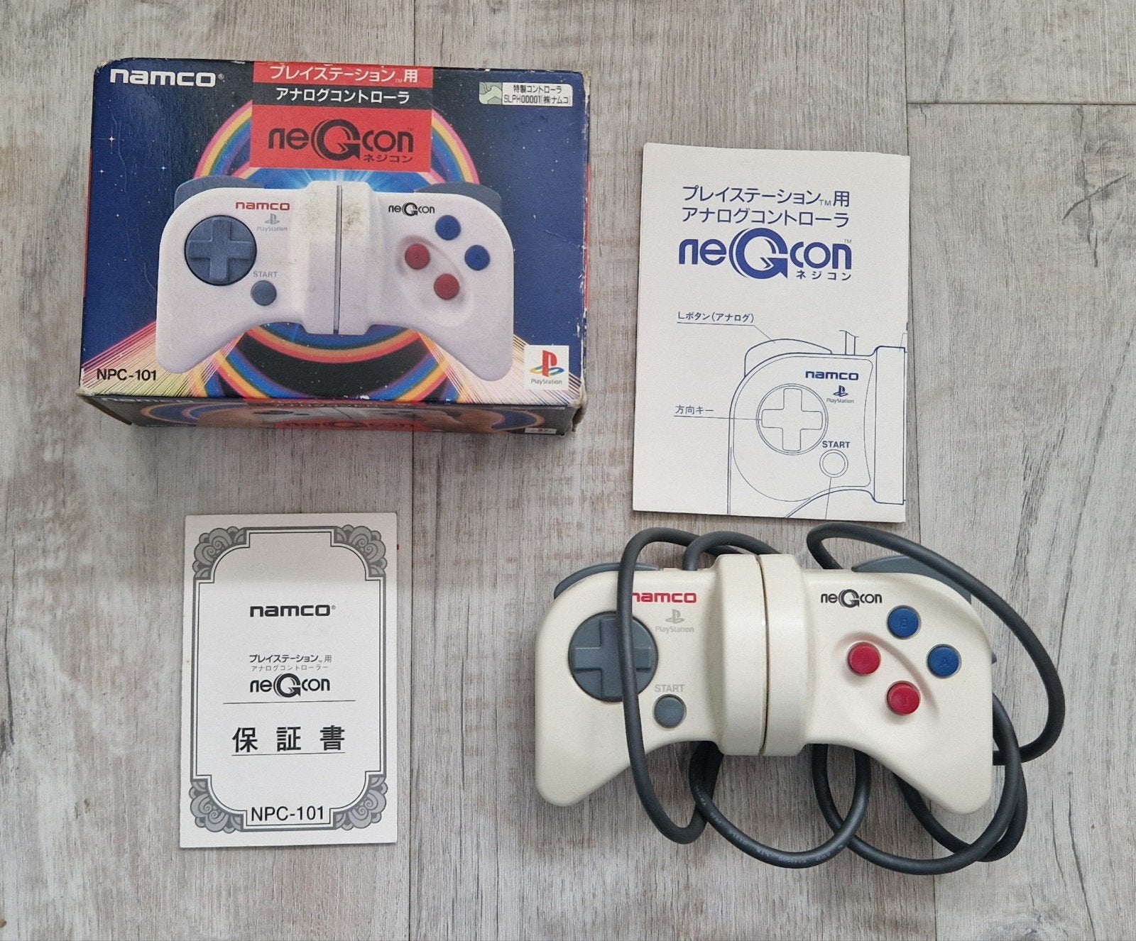 Namco NeGcon Controller voor PlayStation (NPC-101), Spelcomputers en Games, Ophalen of Verzenden, Zo goed als nieuw, Met 1 controller