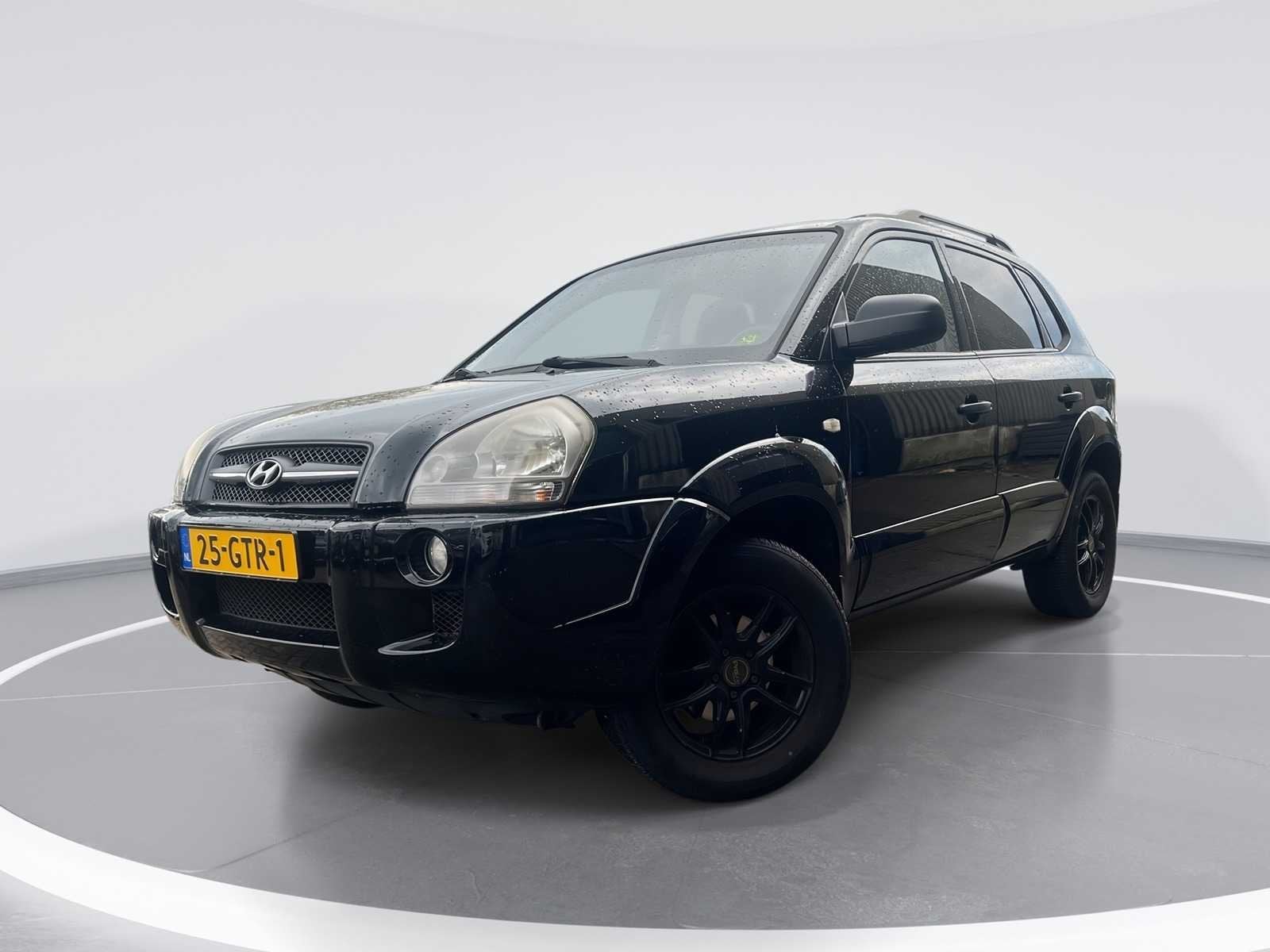 Hyundai Tucson 2.0i Dynamic Executive | 25-GTR-1, Gebruikt, 142 pk, 4 cilinders, Zwart