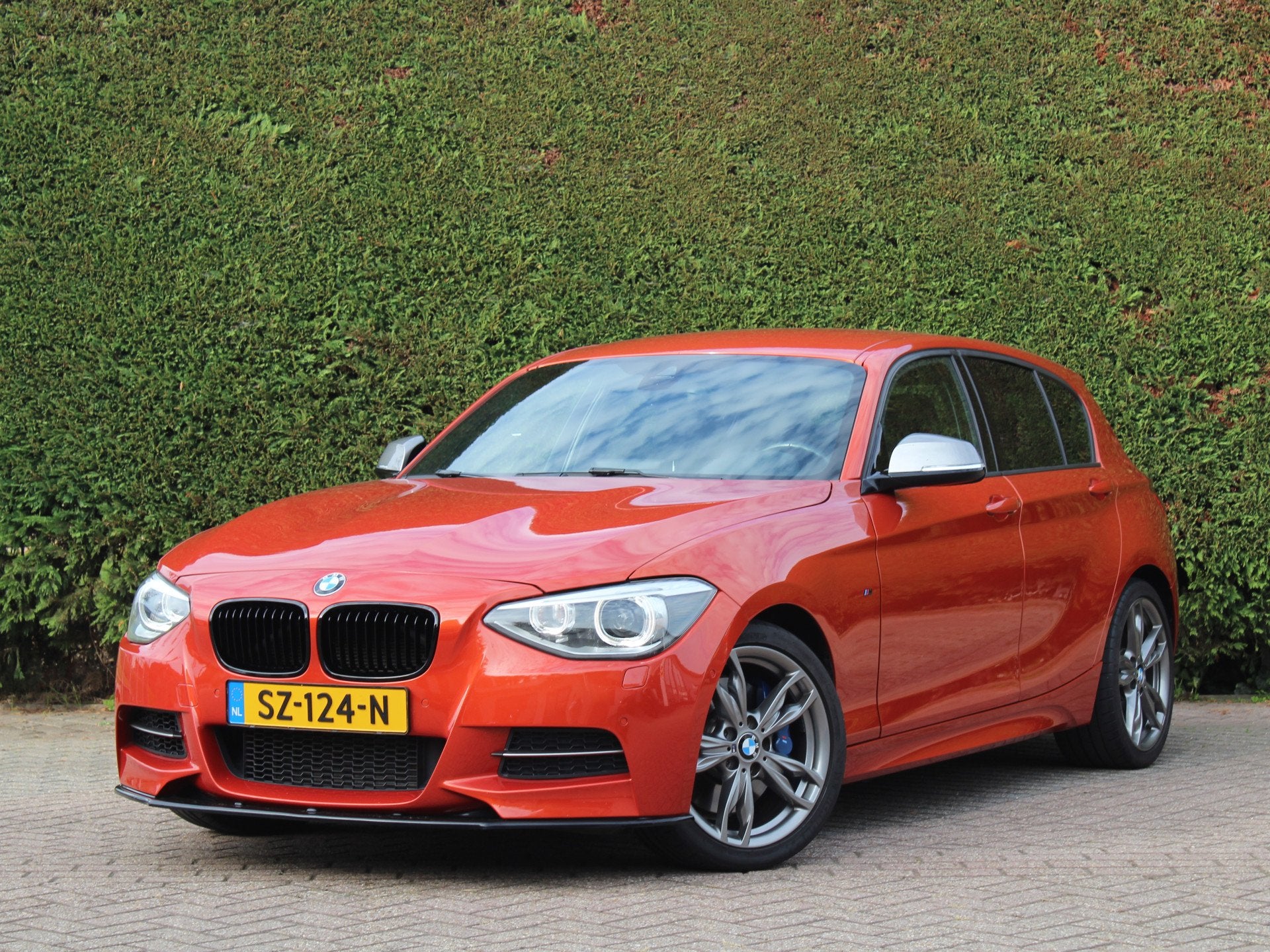 BMW 1-serie M135i xDrive High Executive | M Performance uitl, Gebruikt, Overige kleuren, Xenon verlichting, 320 pk