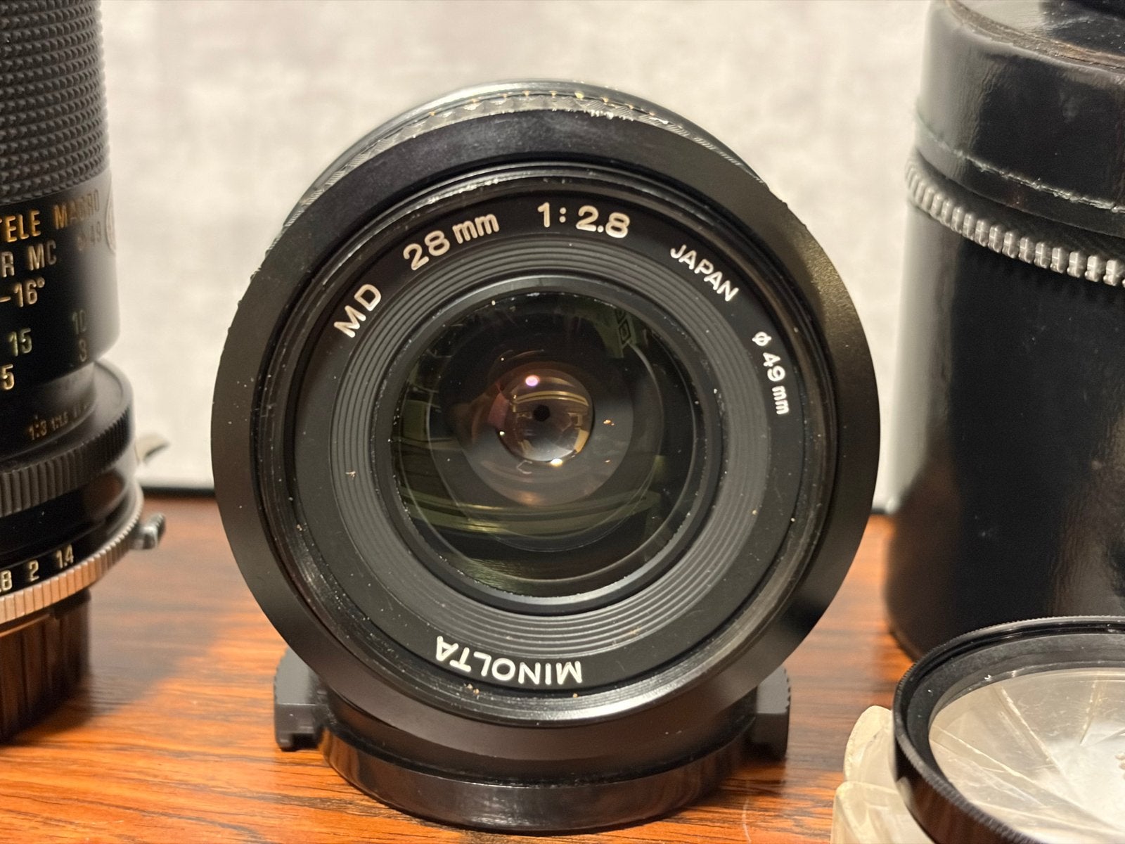 Minolta MD 28mm f/2.8 lens met accessoires, Gebruikt, Overige vattingen, Lensdoppen, Minolta