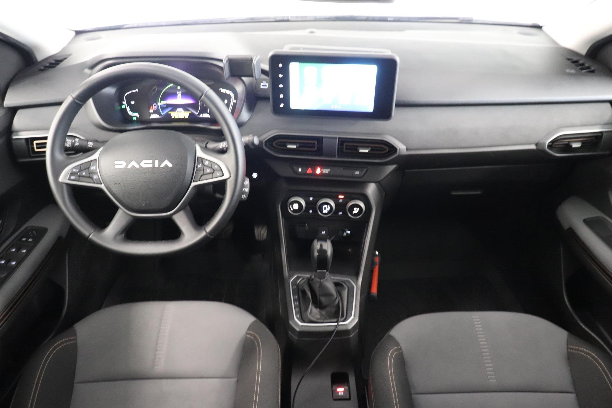 Dacia Jogger 1.6 Hybrid 140 Extreme 7p. | Camera | Trekhaak, Auto's, Gebruikt, 4 cilinders, Met garantie (alle), 7 stoelen