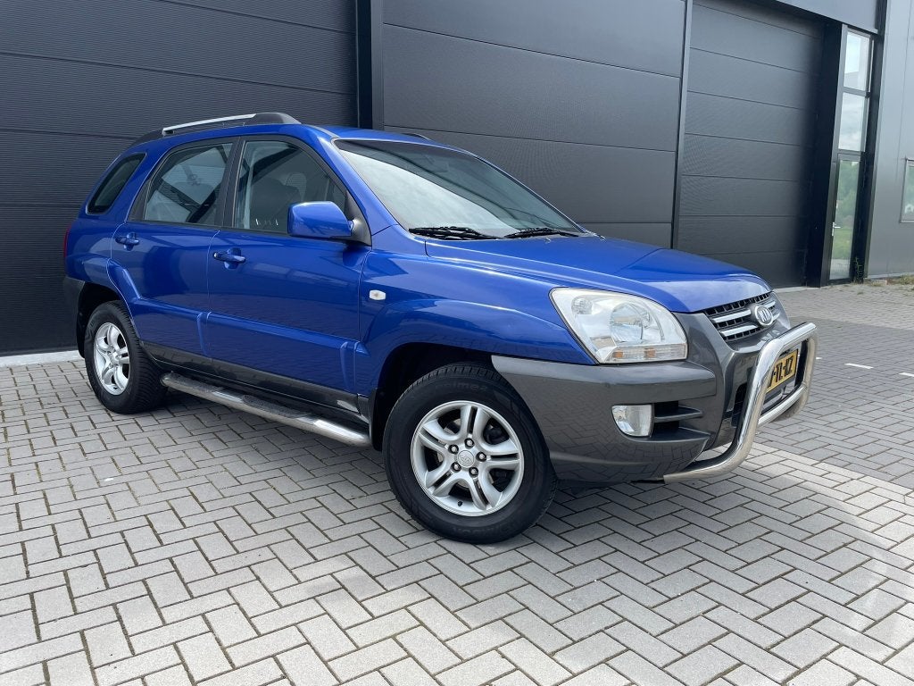 Kia Sportage 2.0 Executive | 111 dkm NAP | Airco | Trekhaak, Auto's, Voorwielaandrijving, 1442 kg, Stof, Zwart