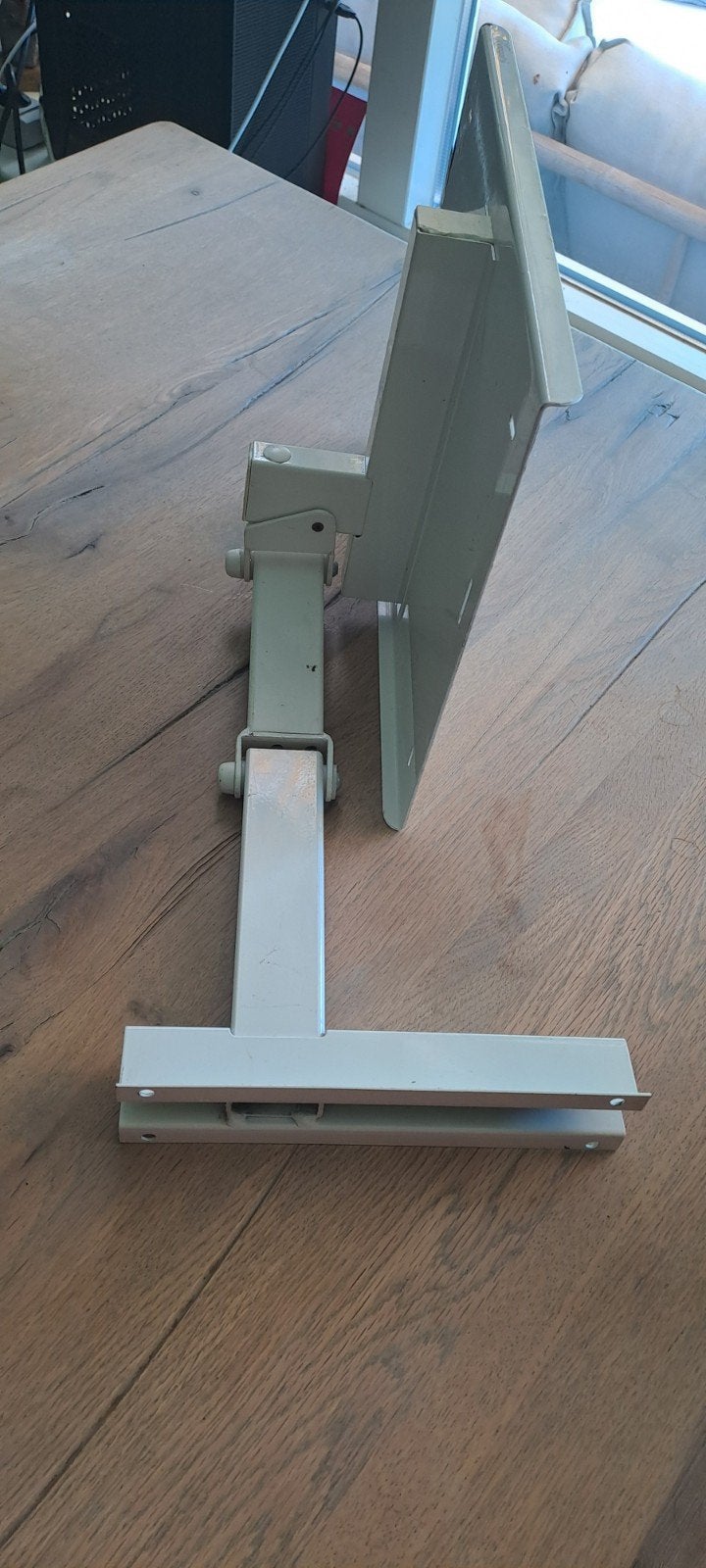 Tv beugel, Ophalen