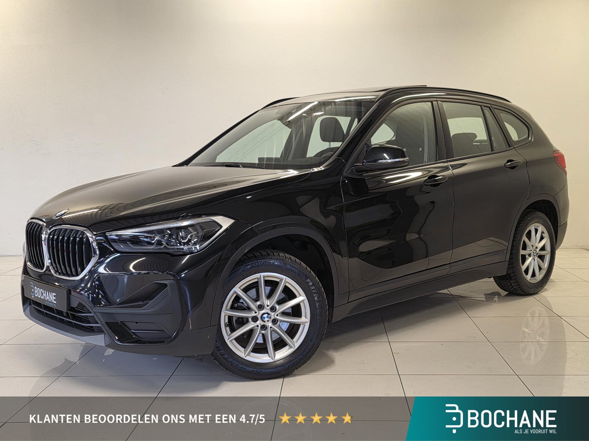 BMW X1 sDrive18i Executive Edition Camera | Panoramadak | Tr, Auto's, Gebruikt, Met garantie (alle), Zwart, Origineel Nederlands