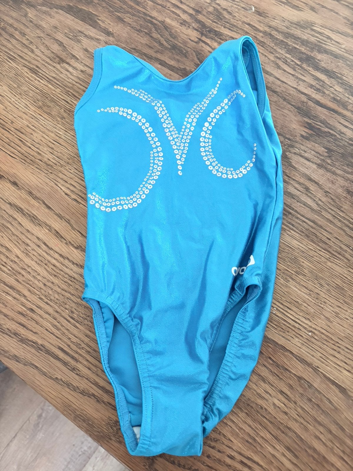Dvo turnpakje maat 6, Sport en Fitness, Kleiner dan kindermaat 122, Ophalen, Zo goed als nieuw, Turnpak(je)