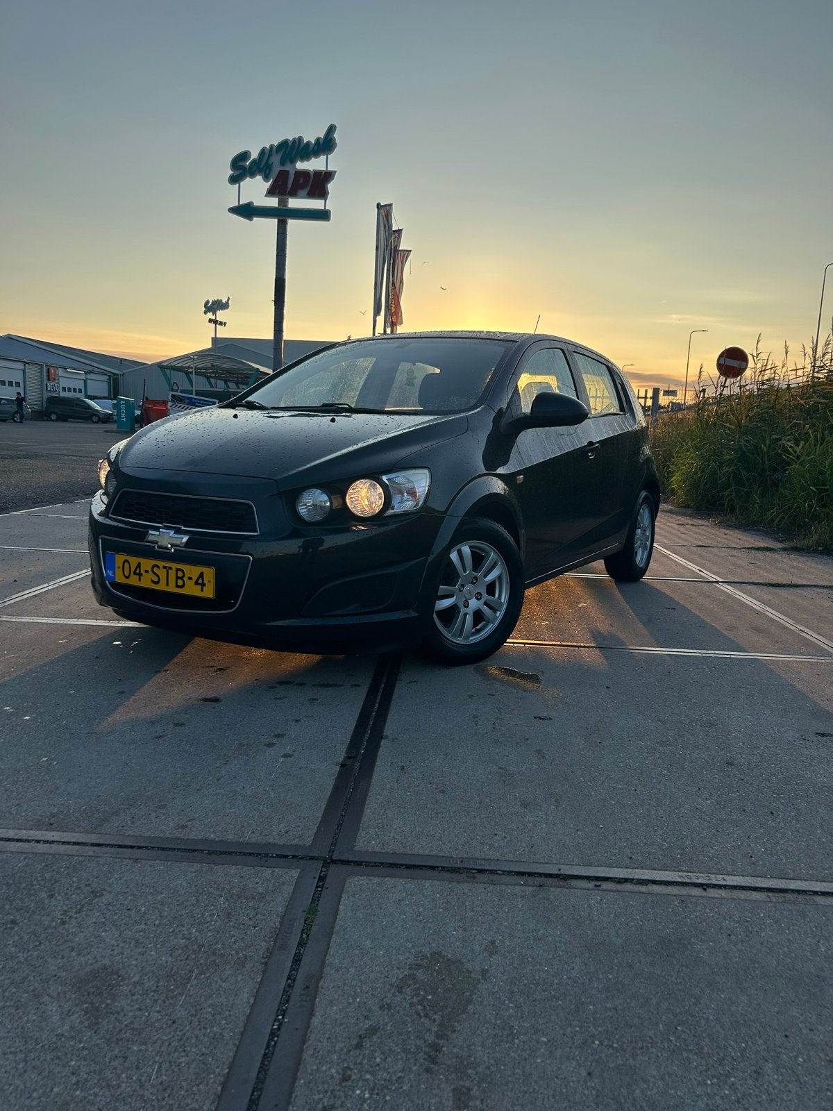 Chevrolet Aveo 1.4 5D 2011 Zwart, Auto's, Voorwielaandrijving, Euro 5, 4 cilinders, Origineel Nederlands