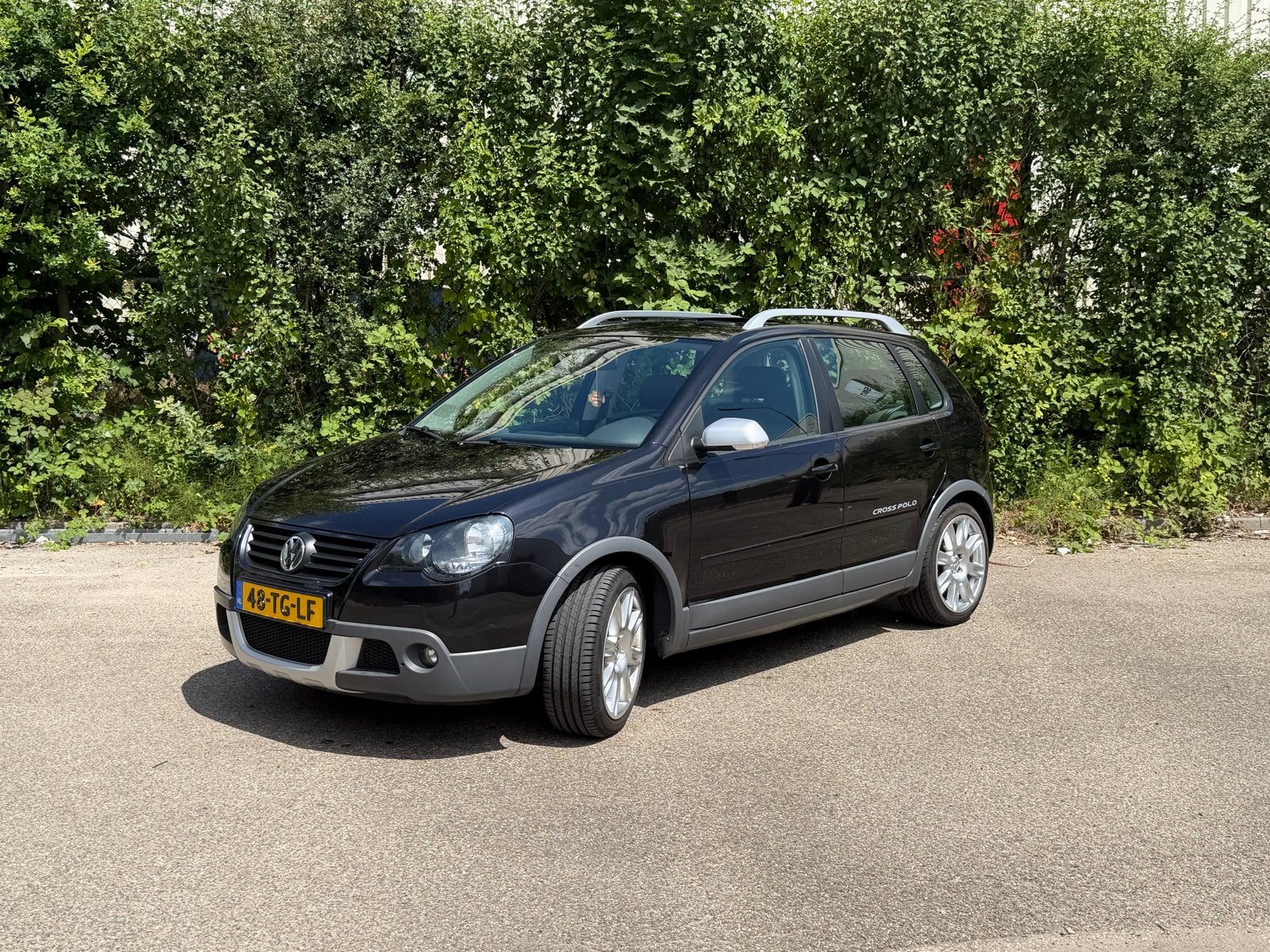 Volkswagen Polo 1.4 16V 59KW Cross 2006 Zwart, Voorwielaandrijving, 15 km/l, 40 €/maand, Zwart