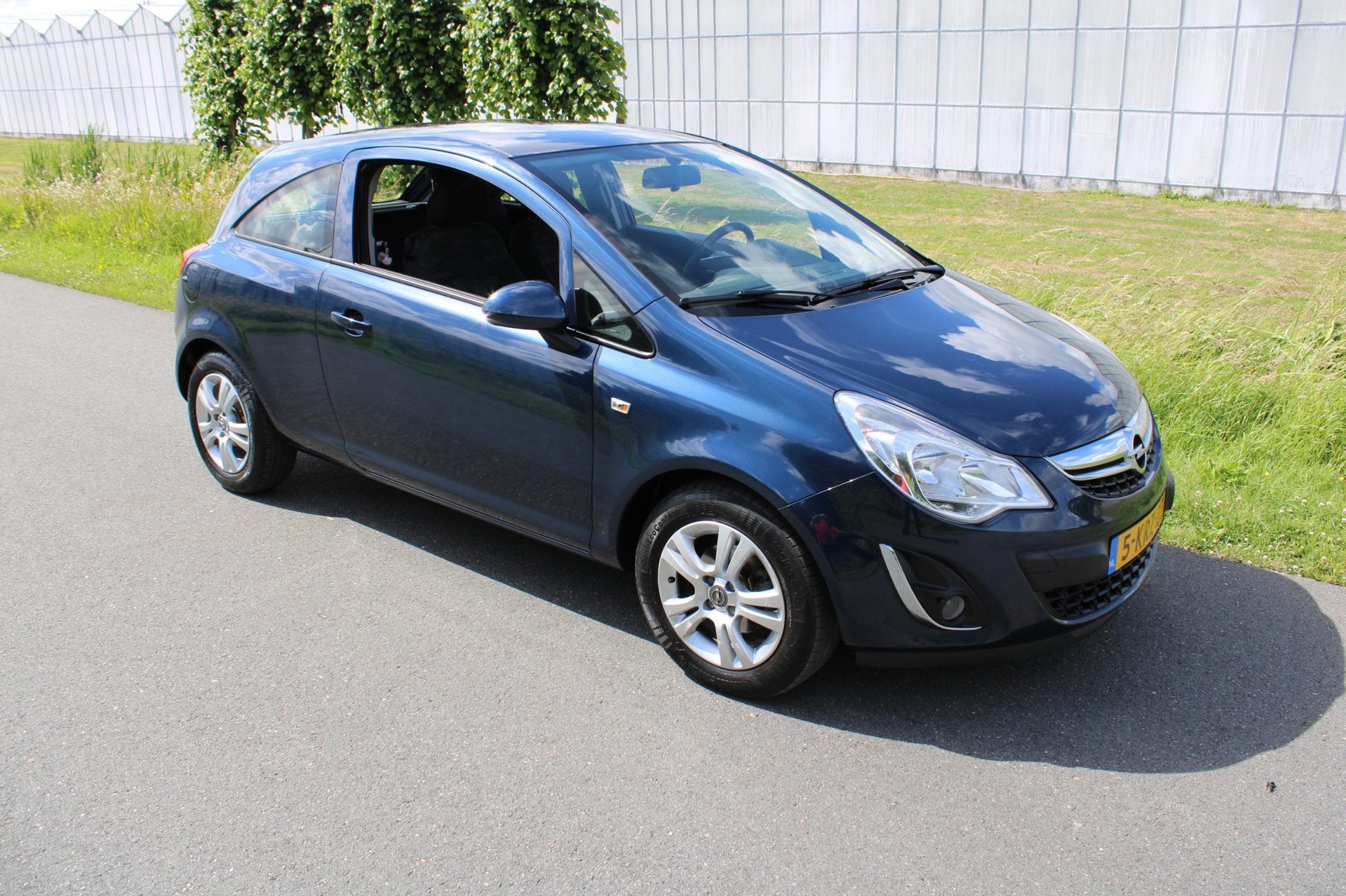 Opel Corsa 1.2-16V Berlin, Auto's, Voorwielaandrijving, 4 cilinders, Blauw, 1229 cc