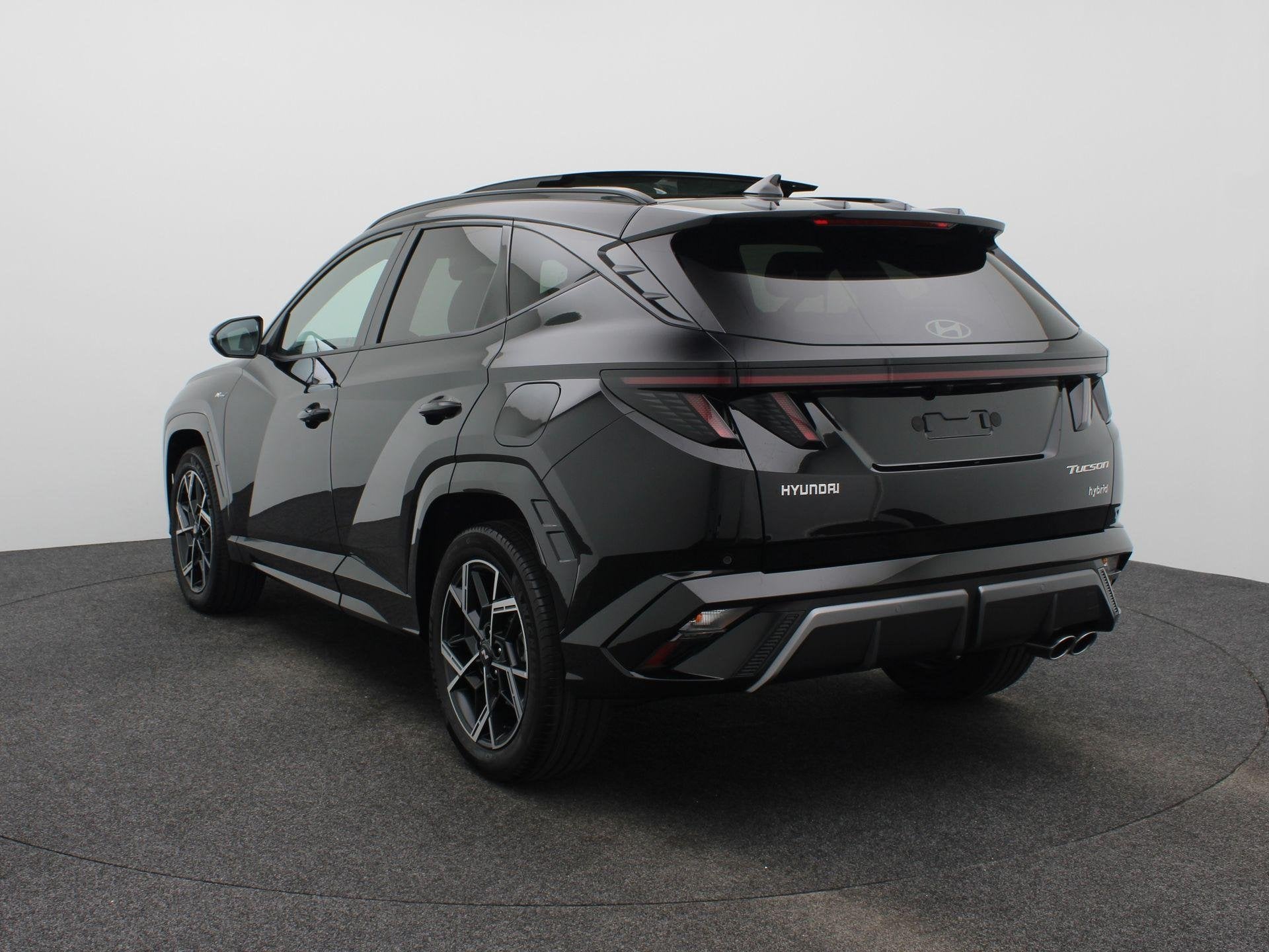 Hyundai Tucson 1.6 T-GDI HEV N Line Business Sky | Schuif/ka, Auto's, 238 pk, 4 cilinders, Zwart, Bedrijf