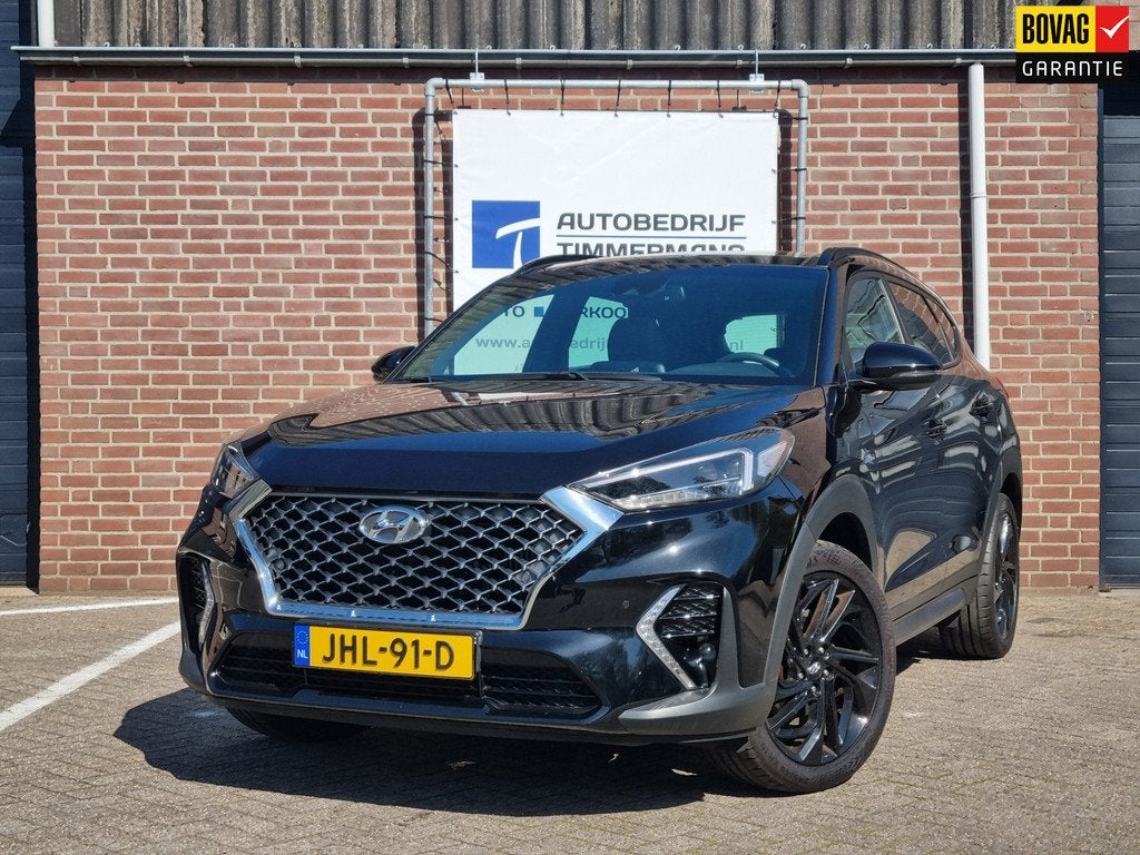 Hyundai TUCSON 1.6 T-GDI N-line Automaat, Auto's, Gebruikt, 4 cilinders, Leder en Stof, Zwart