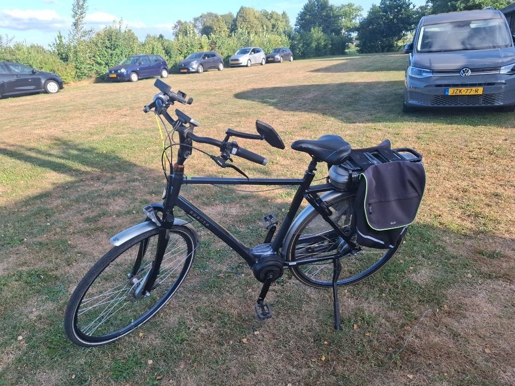 Mooie Elektrische Herenfiets met fietstassen, Ophalen, Sparta, Gebruikt, 50 km per accu of meer